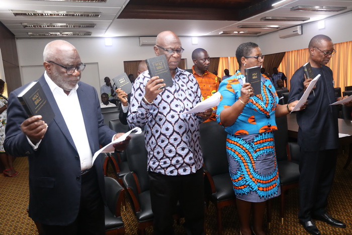 Members of the Public Utilities Regulatory Commission Board taking the oath of office at the Flagstaff House in Accra